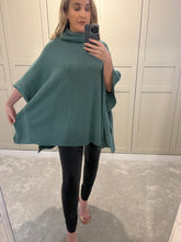 Green poncho