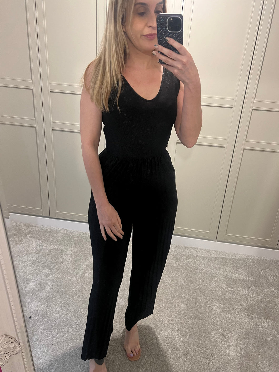 Pleated leg black jumpsuit