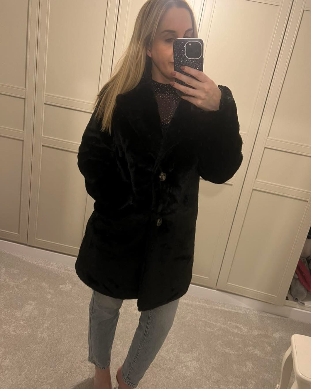 Black faux fur coat