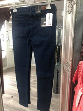 Ladies stretch mid rise jeans